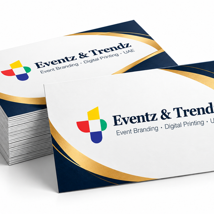 Branded business cards with navy blue and gold design for professional printing in UAE